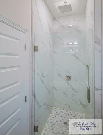 bathroom with an enclosed shower