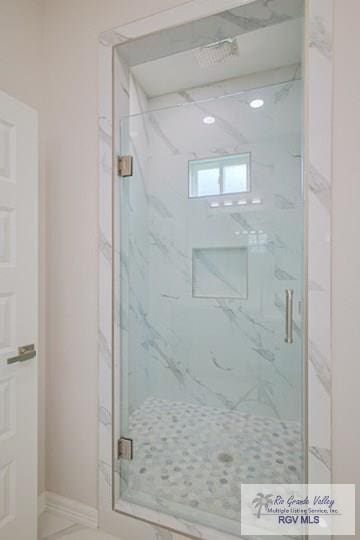 bathroom featuring walk in shower