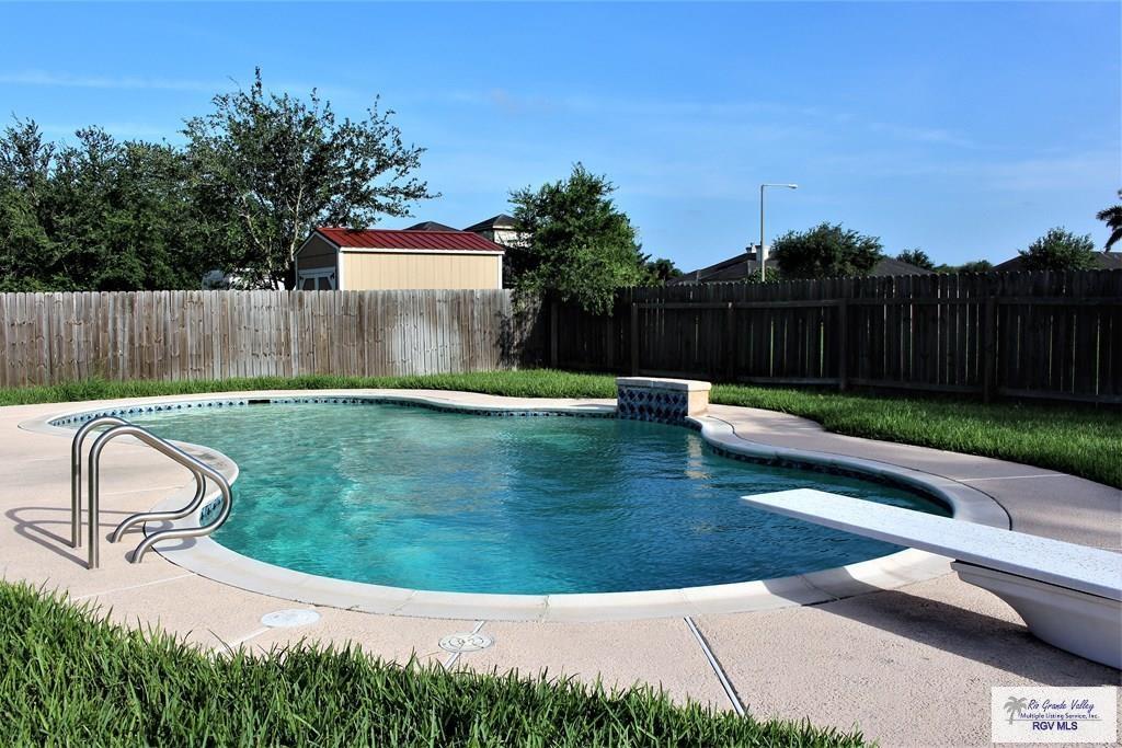 view of swimming pool with a fenced in pool, a patio area, and a fenced backyard