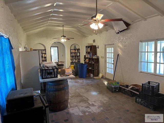 interior space with high vaulted ceiling