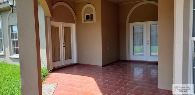 doorway to property with french doors and a patio