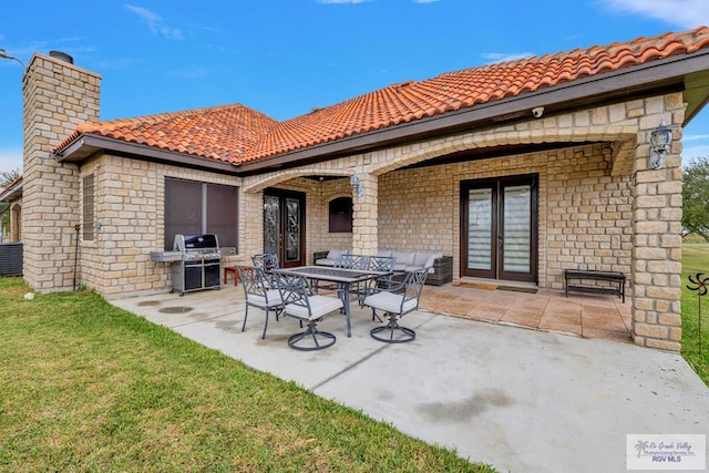 view of patio / terrace featuring french doors and area for grilling