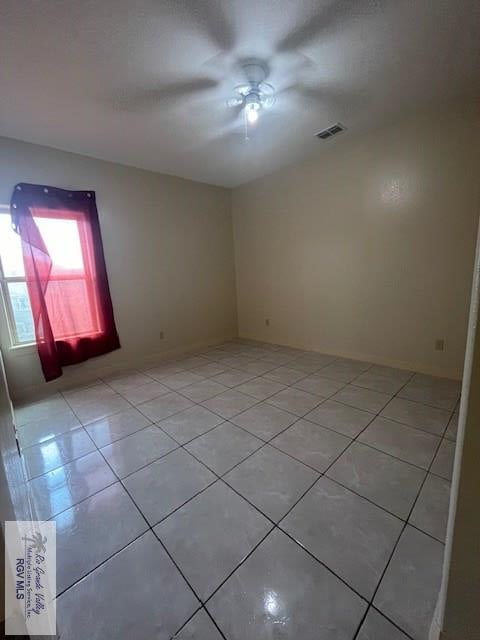 view of tiled spare room