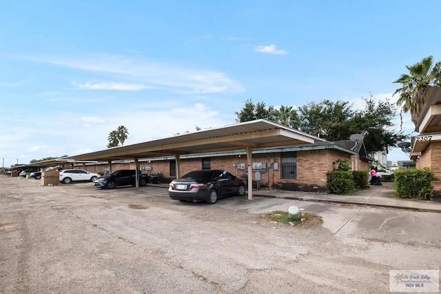 view of car parking with a carport