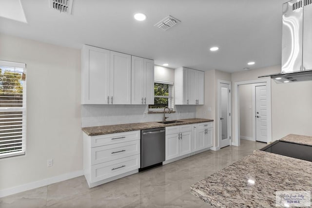 kitchen featuring white cabinetry, sink, light stone counters, and stainless steel dishwasher