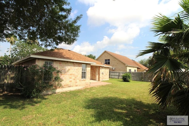2602 E Mark Cir, Harlingen, TX 78550 - back of house featuring brick siding