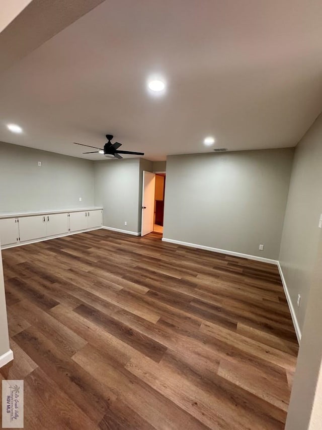 unfurnished living room with hardwood / wood-style floors and ceiling fan