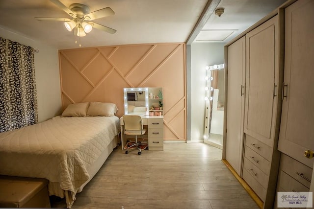 bedroom featuring ceiling fan and light hardwood / wood-style floors