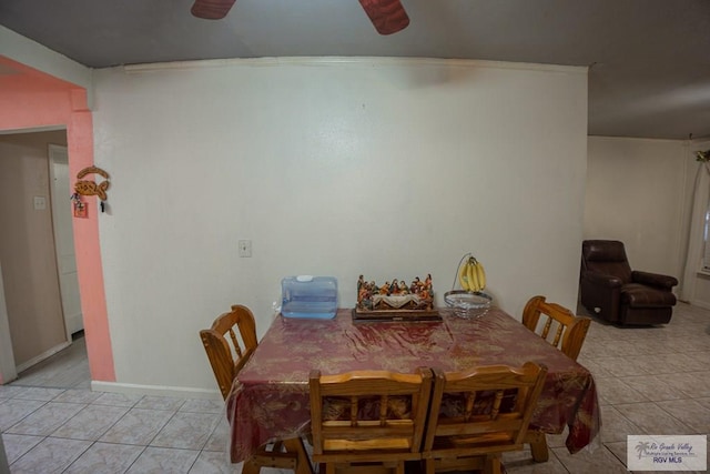 dining area featuring light tile patterned floors