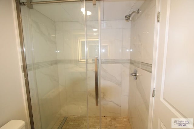 200 Padre Blvd Unit 2306, Port Isabel, TX 78597 - full bath featuring toilet and a marble finish shower