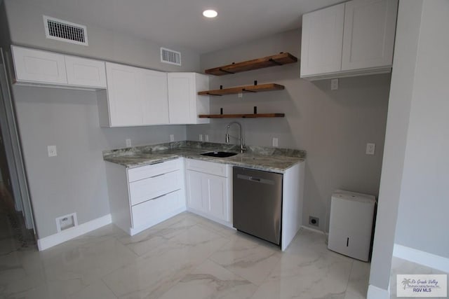 200 Padre Blvd Unit 2306, Port Isabel, TX 78597 - kitchen with dishwasher, open shelves, light stone counters, white cabinets, and recessed lighting