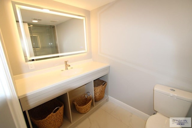 200 Padre Blvd Unit 2306, Port Isabel, TX 78597 - bathroom featuring vanity and marble finish floors