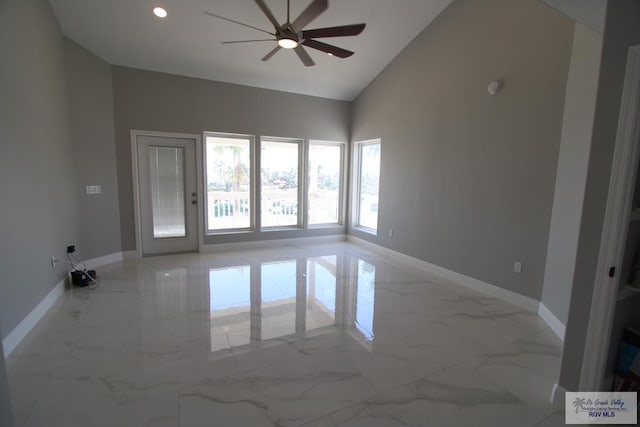 200 Padre Blvd Unit 2306, Port Isabel, TX 78597 - spare room featuring ceiling fan, light marble finish flooring, high vaulted ceiling, recessed lighting, and a smoke detector