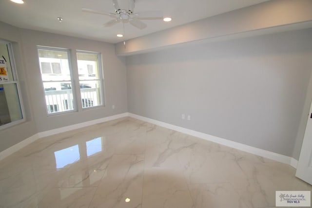 200 Padre Blvd Unit 2306, Port Isabel, TX 78597 - empty room featuring recessed lighting, marble finish flooring, and ceiling fan