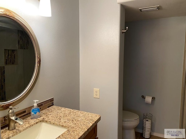 2010 El Dorado Ave, Rancho Viejo, TX 78575 - bathroom with vanity and toilet