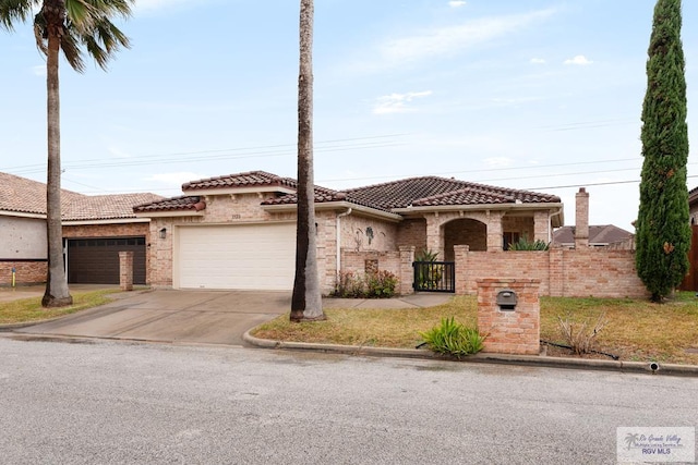 mediterranean / spanish-style home featuring a garage