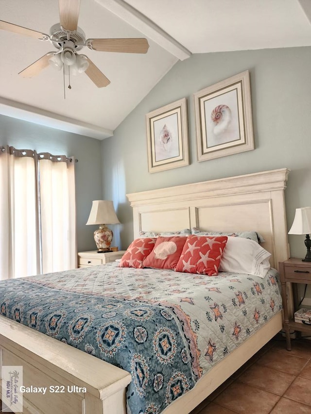 bedroom with vaulted ceiling with beams, ceiling fan, and tile patterned floors