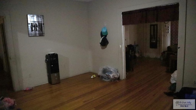 hallway featuring dark wood-type flooring