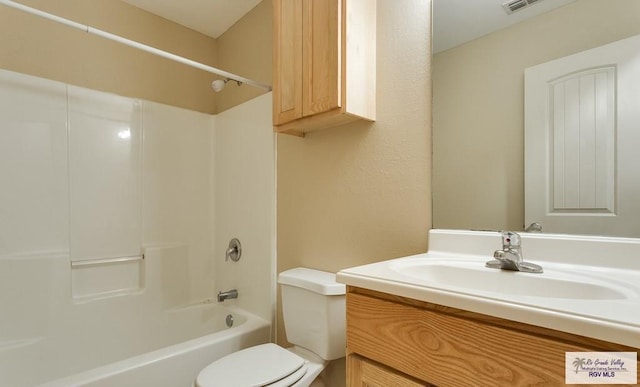 full bathroom featuring vanity, toilet, and shower / washtub combination