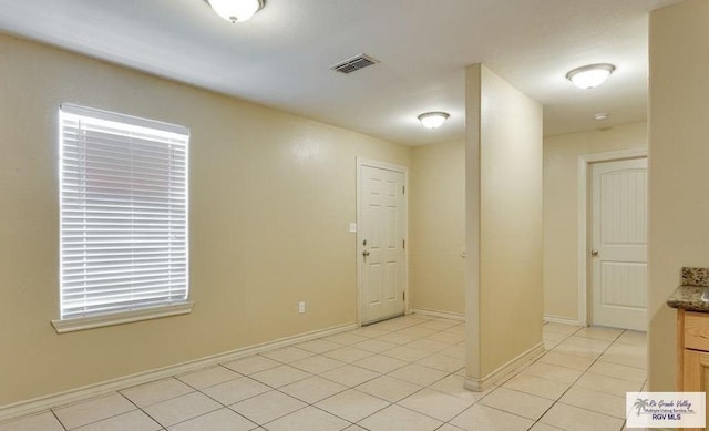 interior space featuring light tile patterned flooring