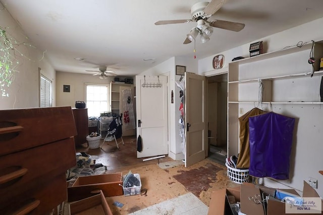 interior space featuring ceiling fan