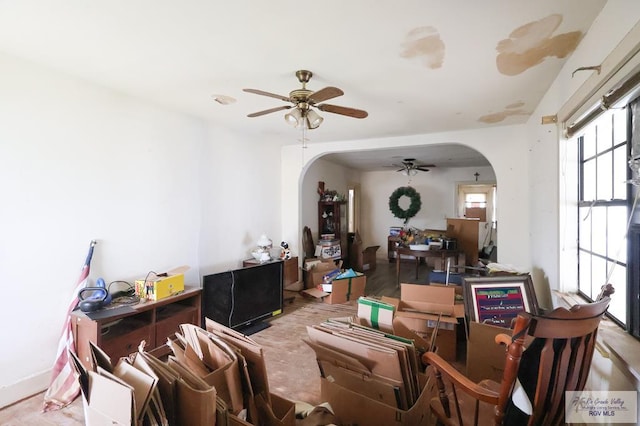 interior space featuring ceiling fan