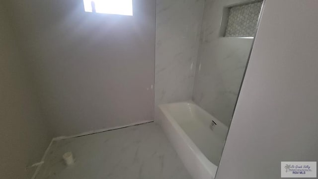 bathroom featuring a bathtub