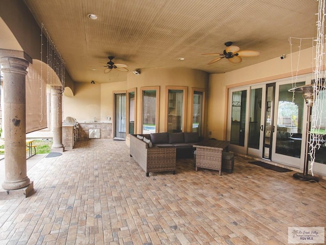 100 Paloma St, San Benito, TX 78586 - view of patio / terrace featuring an outdoor living space and ceiling fan