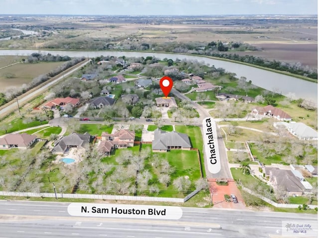 100 Paloma St, San Benito, TX 78586 - aerial view with a residential view and a water view