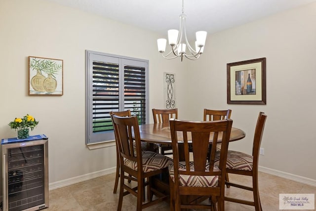 dining space featuring light tile patterned floors, beverage cooler, and a notable chandelier