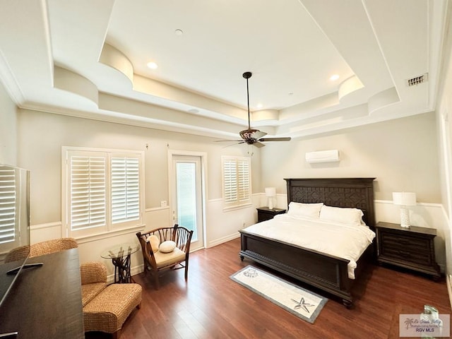107 E Palm St Unit B, South Padre Island, TX 78597 - bedroom featuring recessed lighting, access to outside, a tray ceiling, a ceiling fan, and wood finished floors