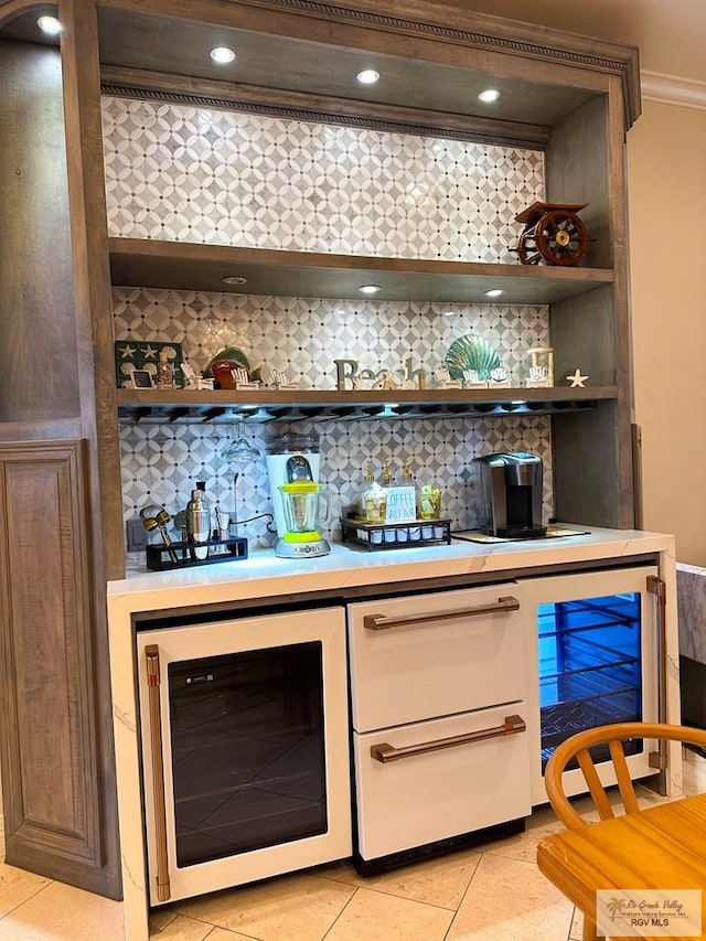 107 E Palm St Unit B, South Padre Island, TX 78597 - bar with light tile patterned floors, a bar, decorative backsplash, and beverage cooler