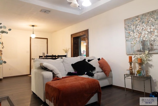 living room featuring dark hardwood / wood-style flooring