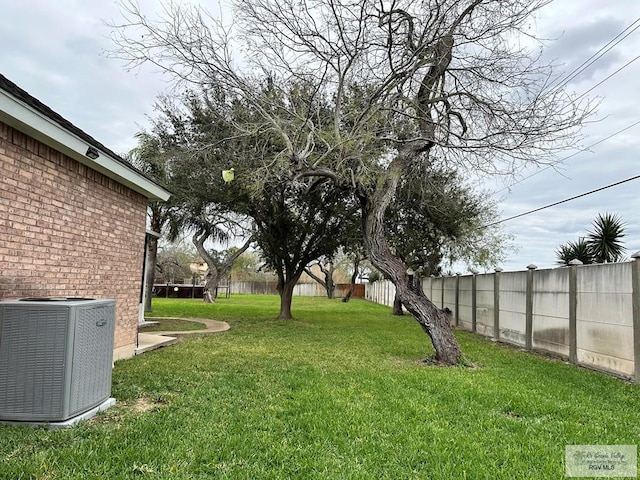 view of yard featuring central AC unit