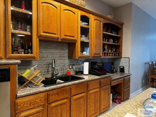 kitchen with sink and backsplash