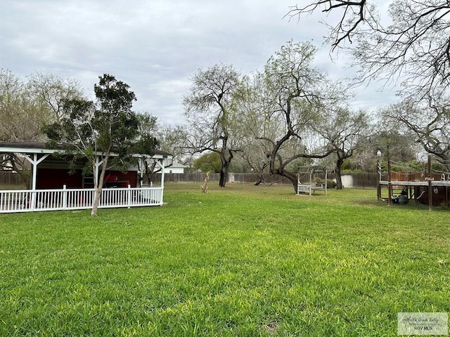 view of yard featuring a trampoline