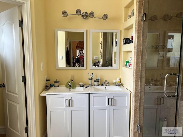 bathroom with vanity and walk in shower