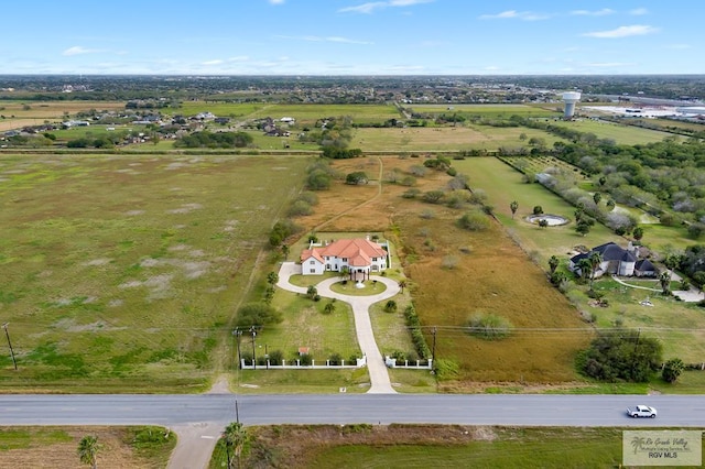 birds eye view of property featuring a rural view