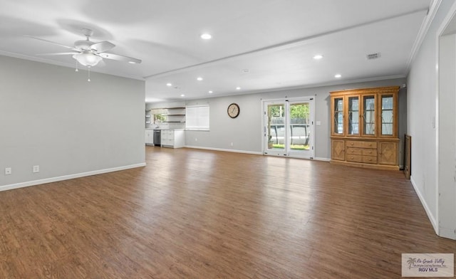 unfurnished living room featuring recessed lighting, ornamental molding, wood finished floors, a ceiling fan, and baseboards