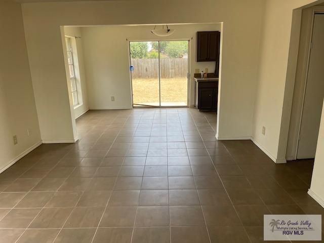 view of tiled spare room