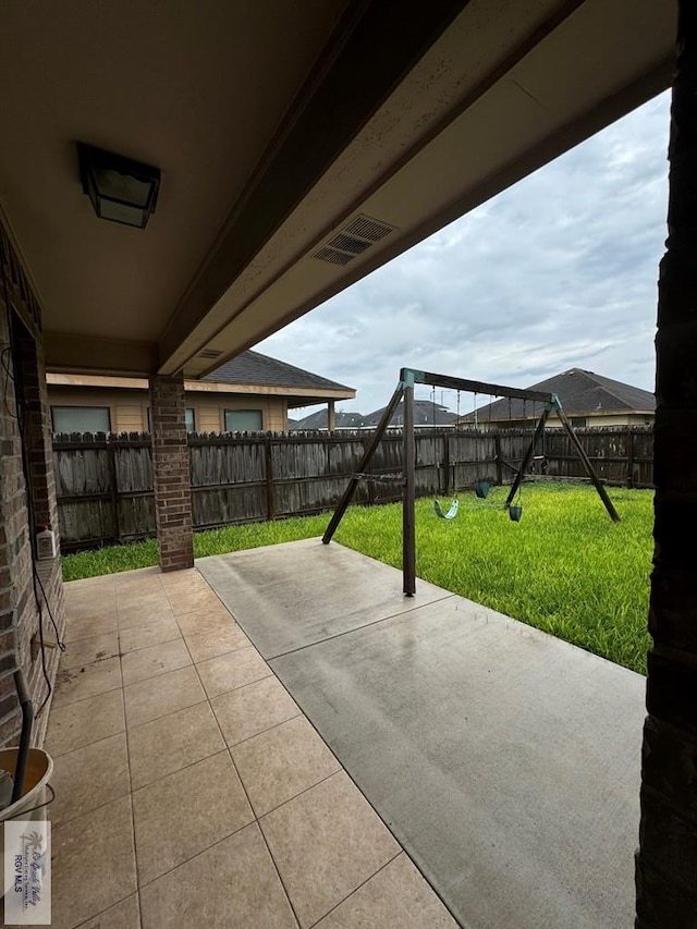 view of patio / terrace featuring a playground