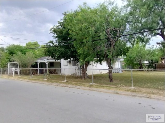335 Edwards St, San Benito, TX 78586 - view of property hidden behind natural elements