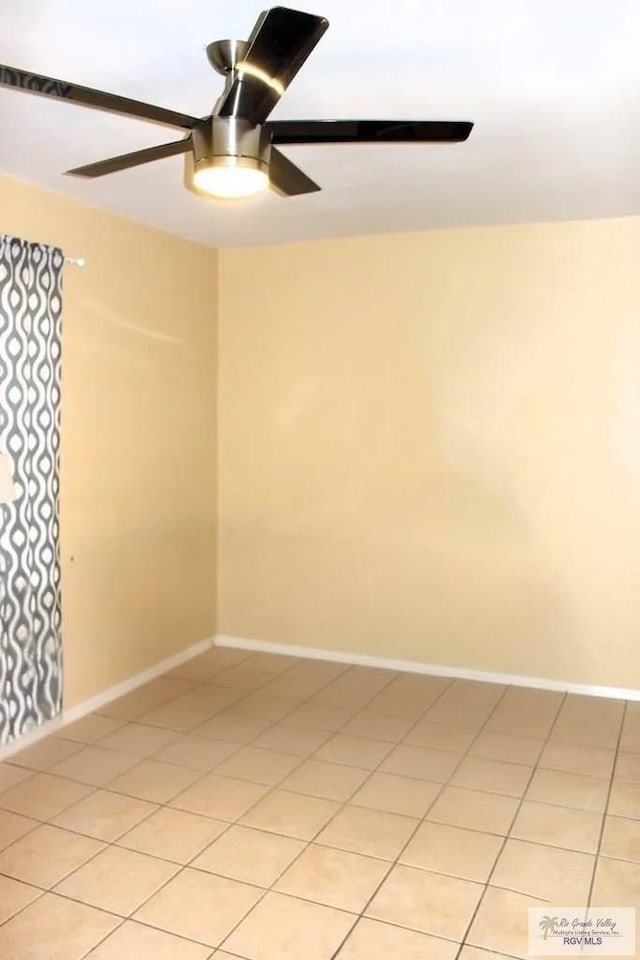 122 Regency Ct, Harlingen, TX 78550 - spare room with a ceiling fan and baseboards