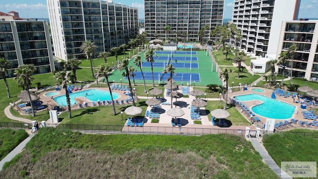 406 Padre Blvd Unit 401, South Padre Island, TX 78597 - view of property location featuring a pool area and nearby urban area