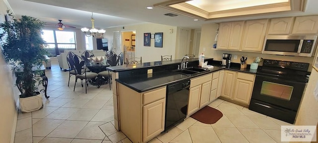 406 Padre Blvd Unit 401, South Padre Island, TX 78597 - kitchen featuring a sink, black appliances, ornamental molding, open floor plan, and a peninsula