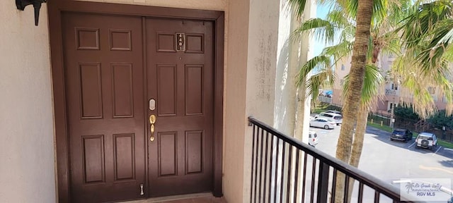 406 Padre Blvd Unit 401, South Padre Island, TX 78597 - property entrance with stucco siding