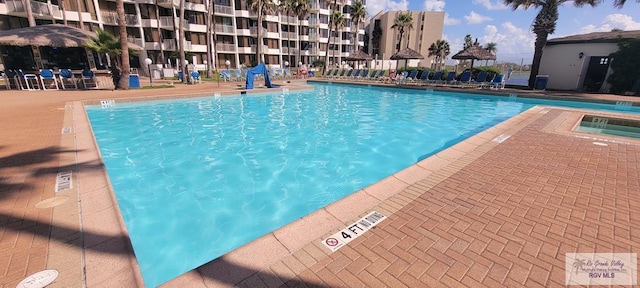 406 Padre Blvd Unit 401, South Padre Island, TX 78597 - view of community pool