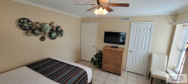 406 Padre Blvd Unit 401, South Padre Island, TX 78597 - bedroom with light tile patterned floors, crown molding, and a ceiling fan
