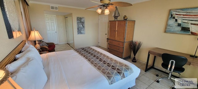 406 Padre Blvd Unit 401, South Padre Island, TX 78597 - tiled bedroom featuring crown molding and a ceiling fan