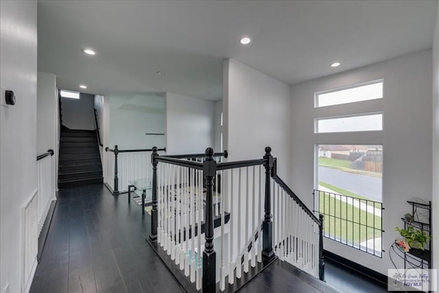 3213 E Westgate Cir, Harlingen, TX 78552 - hall with dark wood-type flooring, plenty of natural light, and recessed lighting